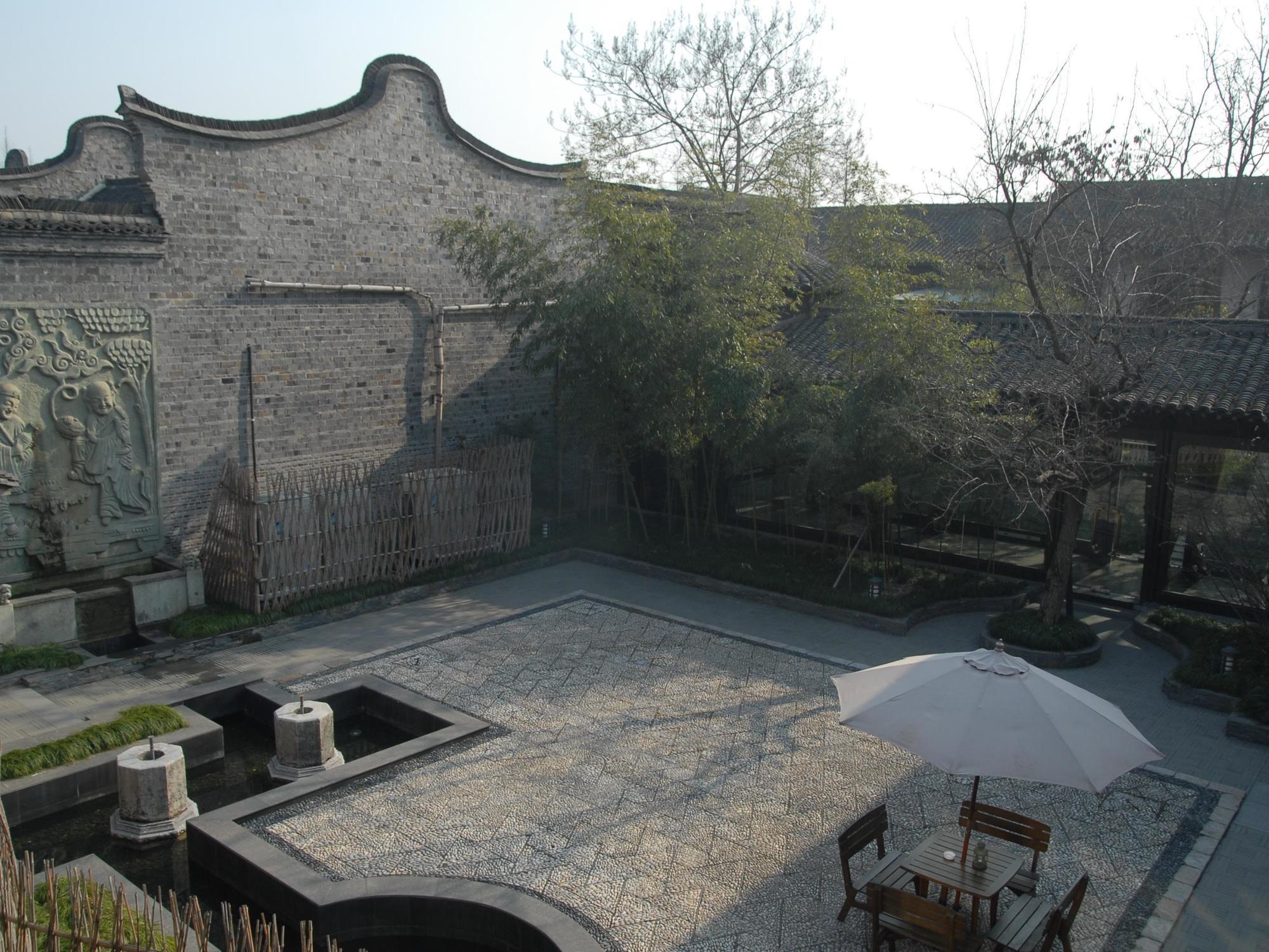Wuzhen Clubhouse Hotel Jiaxing Bagian luar foto