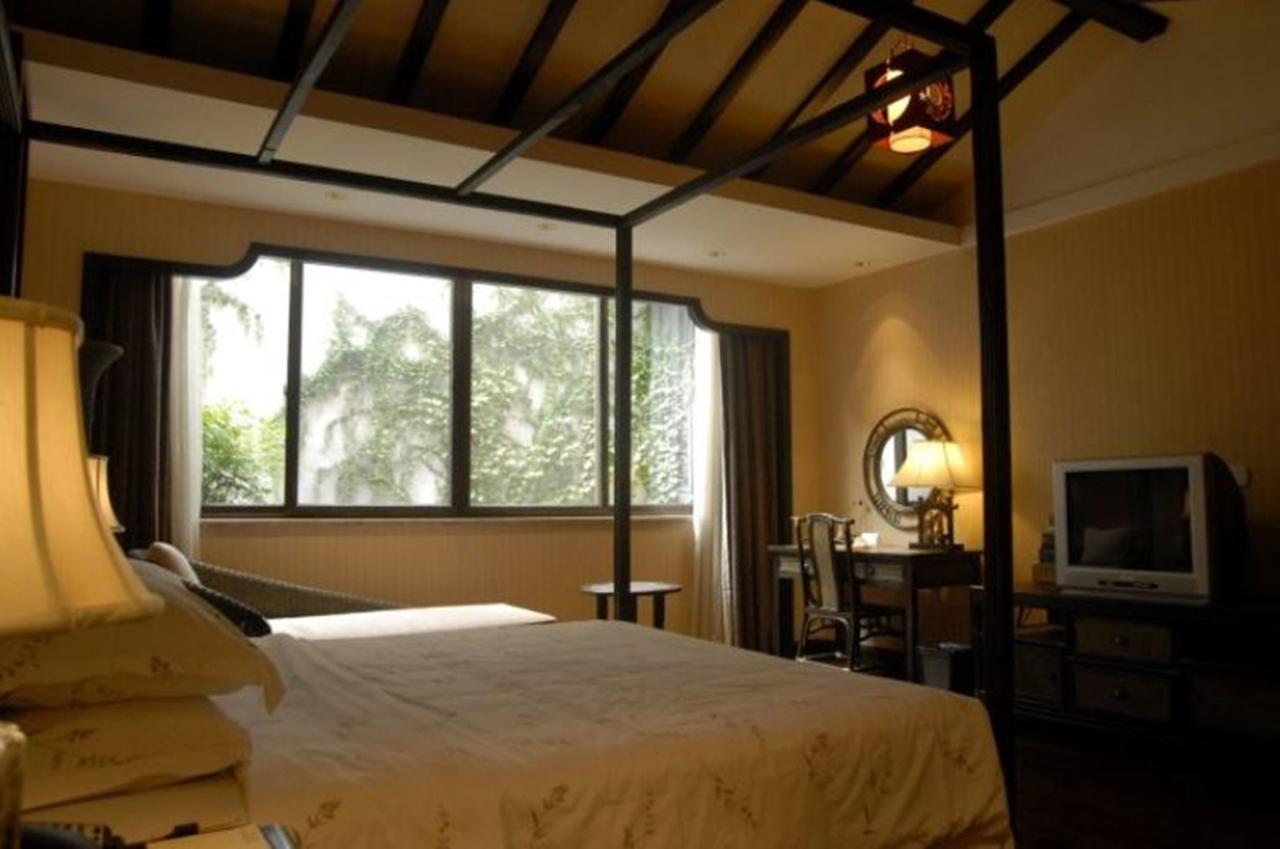 Wuzhen Clubhouse Hotel Jiaxing Bagian luar foto